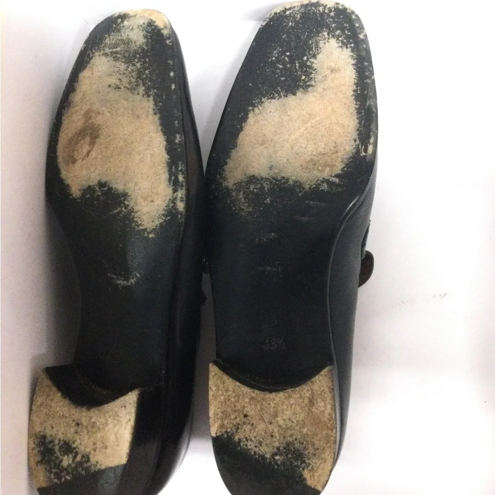 Classic Black Leather Slip-On Loafers with Gold Hardware